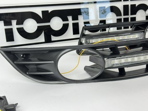 Рамки противотуманные на VW Passat B6 с динамическим указателем поворота  тюнинг фото