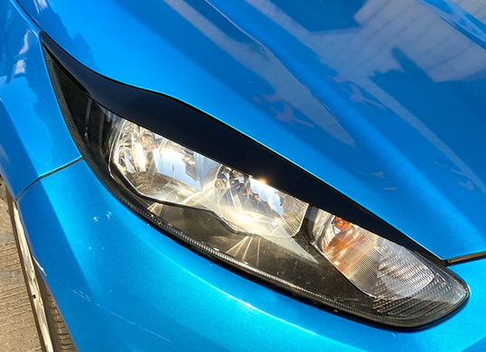 Накладки на фари, вії Ford Fiesta MK6 чорні глянсові ABS-пластик (13-17 р.в.) тюнінг фото