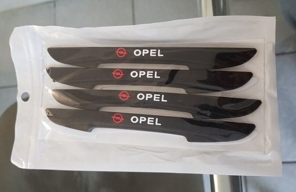 Защитные резиновые накладки на кузов Opel тюнинг фото