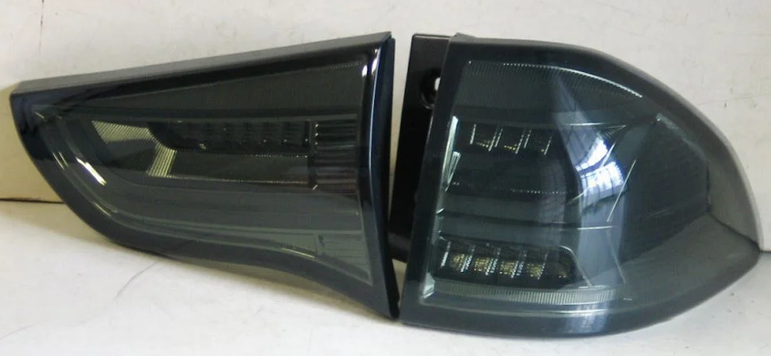 Оптика задняя, фонари Mitsubishi Pajero Sport, дымчатые (10-15 г.в.) тюнинг фото