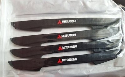 Защитные резиновые накладки на кузов Mitsubishi тюнинг фото