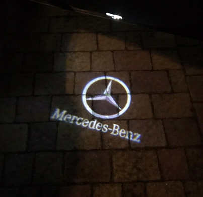 Подсветка дверей с логотипом Mercedes 211 тюнинг фото
