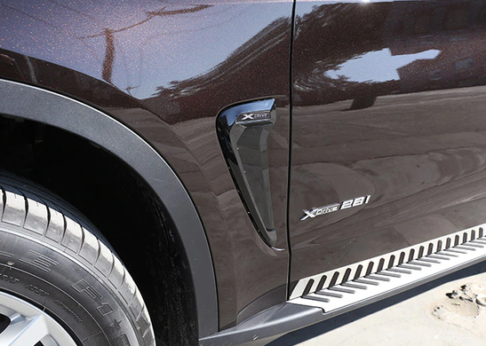 Накладки на крила-зябра BMW X5 F15 стиль Xdrive чорні тюнінг фото