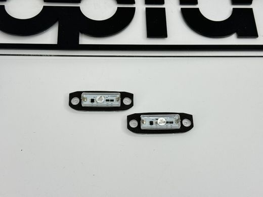Підсвічування номера Вольво S40/V50/S60/S80/V70/XC60/XC70/XC90 тюнінг фото