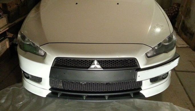 Вставка между клыками Mitsubishi Lancer X тюнинг фото