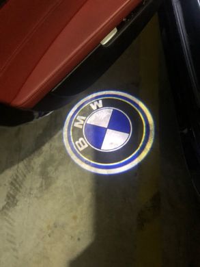 Подсветка дверей с логотипом авто БМВ (синяя) тюнинг фото