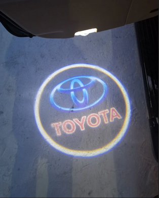 Підсвічування дверей з логотипом для Toyota  тюнінг фото