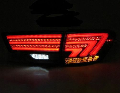 Оптика задня, ліхтарі на Toyota Highlander II (14-17 р.в.) тюнінг фото