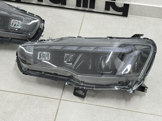 Оптика передня, фари на Mitsubishi Lancer тюнінг фото