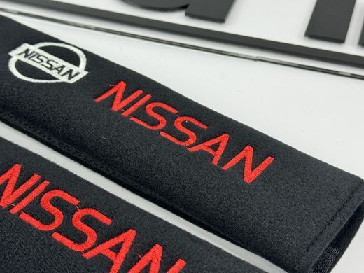 Накладки (чохли) для ременя безпеки Nissan тюнінг фото