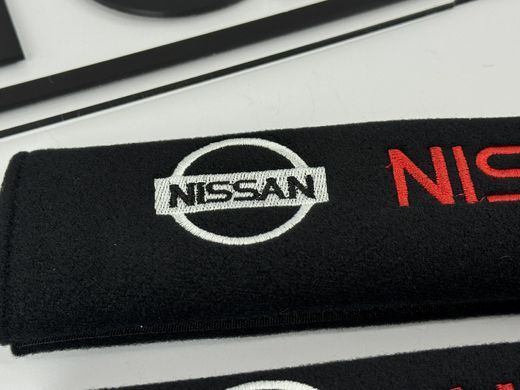 Накладки (чохли) для ременя безпеки Nissan тюнінг фото