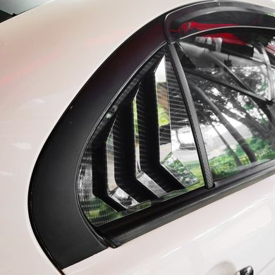 Накладки (жабры) на окна задних дверей Mitsubishi Lancer X под карбон тюнинг фото