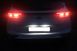 Подсветка номера на Kia Sportage тюнинг фото