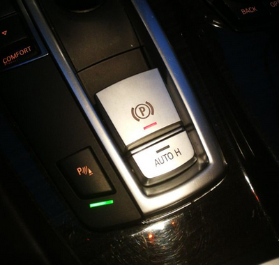 Накладка на кнопку центрального гальма BMW X5 Е70 / X6 E71 тюнінг фото