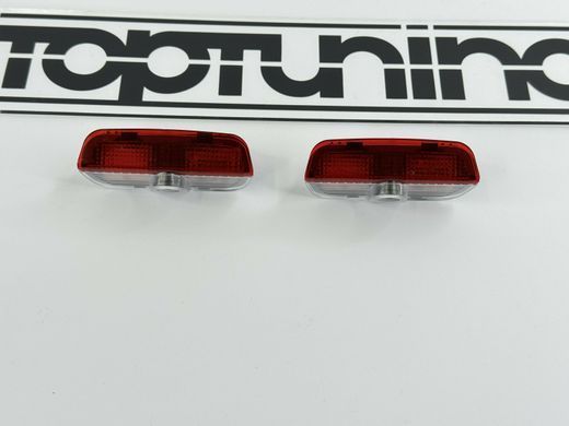Підсвічування дверей з логотипом авто Фольксваген тюнінг фото